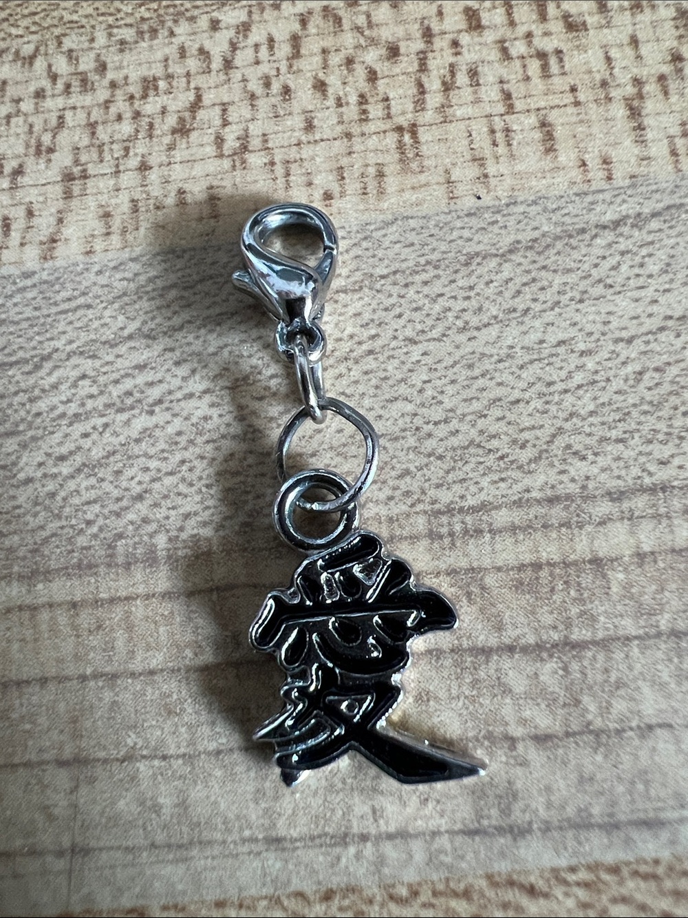 Silver-Tone Black Enamel Character Charm Pendant